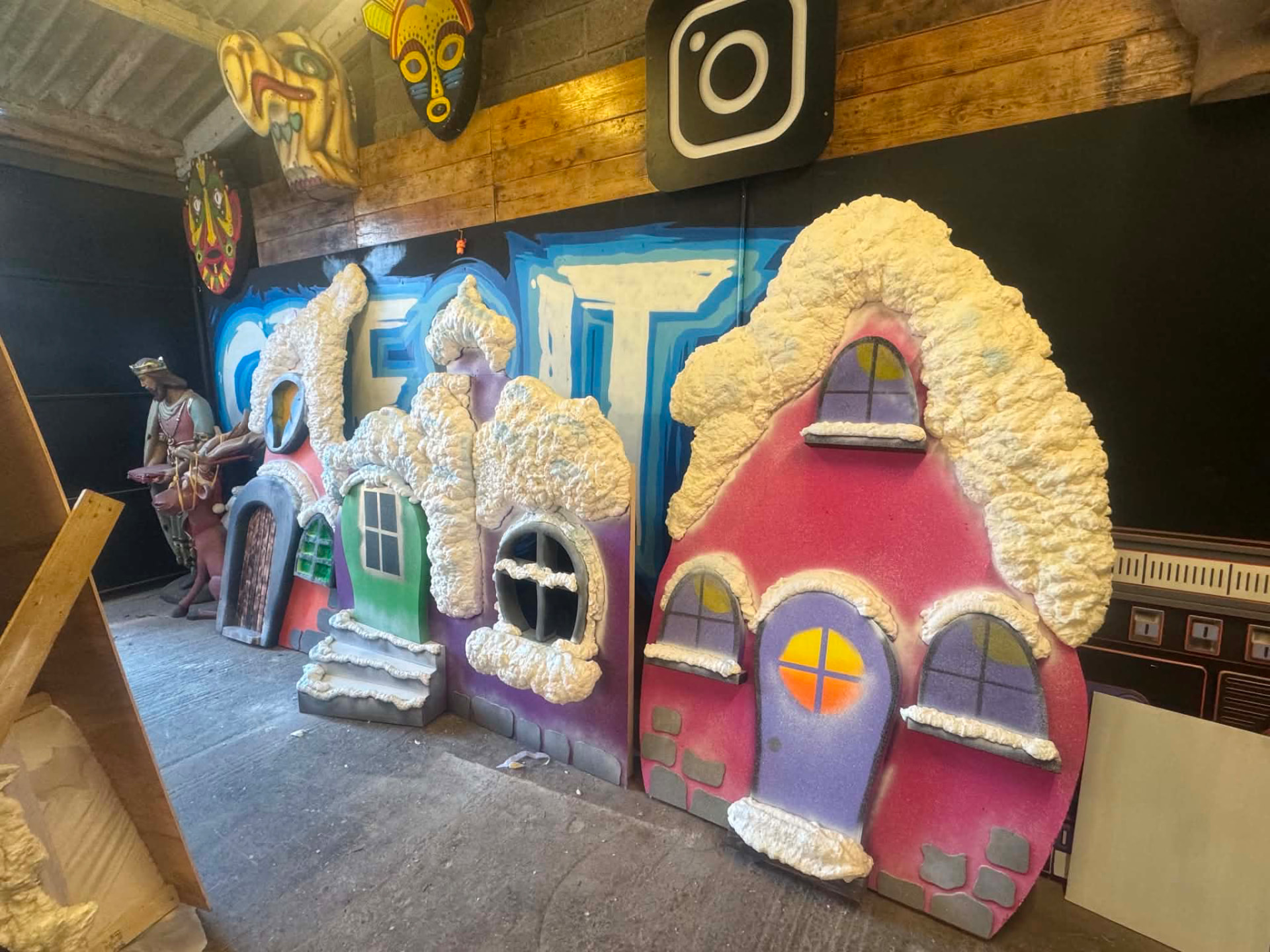 Handcrafted Whoville houses lined up in the Cre8it workshop