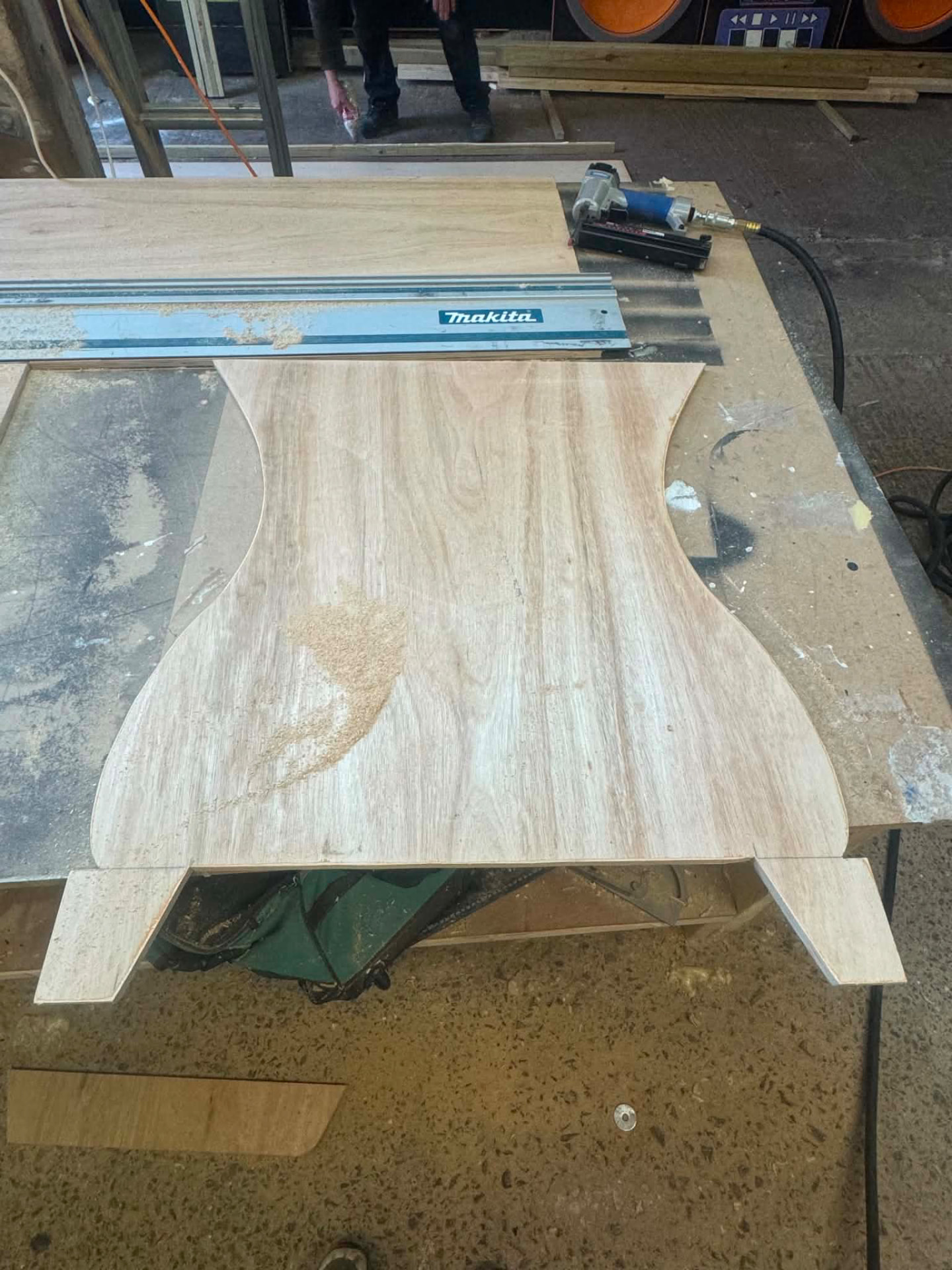 CNC-shaped ply component cut on the workshop bench